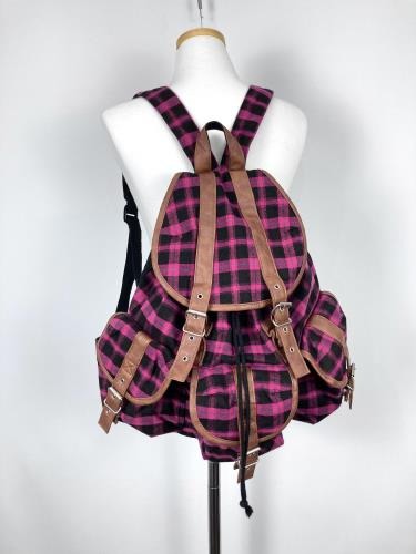 pink check leather strap backpack